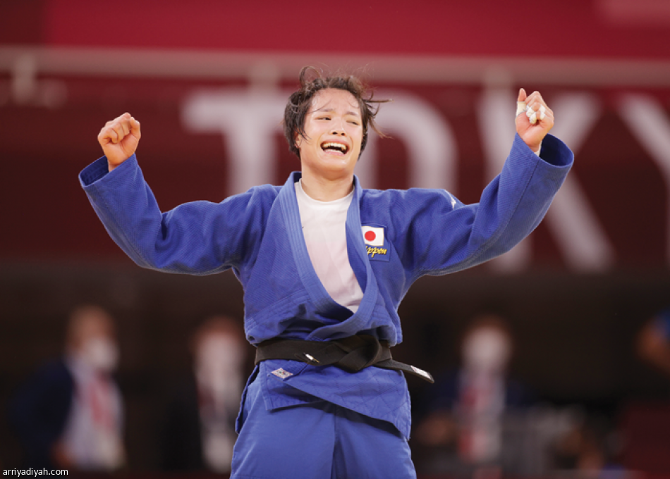 شقيقان يابانيان يحرزان ميدالية ذهبية 